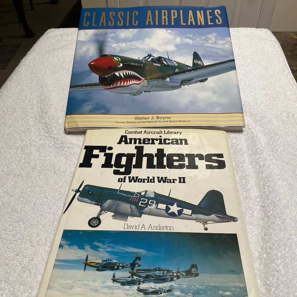 2 Hard Cover Airplane Books.